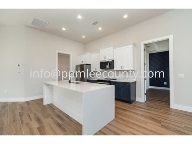 Photo - Brand new 4 bedroom 2 bath 3 car garage po...