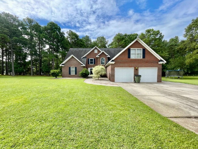 Building Photo - Spacious 3-Bedroom Nest with 2.5 Baths And... Rental