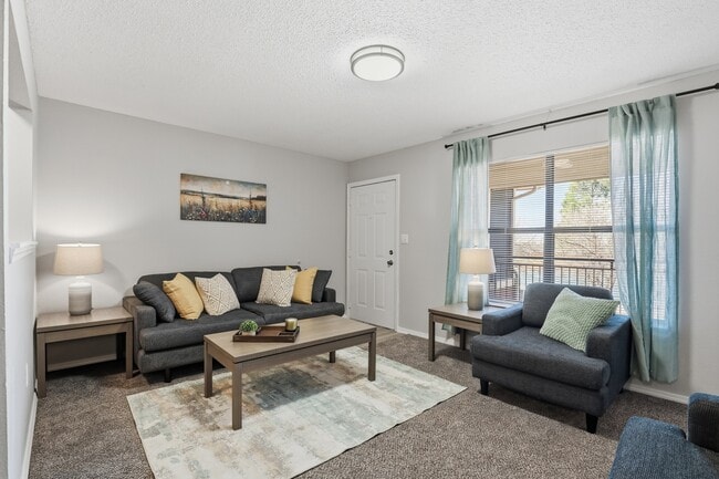 Bright, open-concept living room with space to relax or entertain.