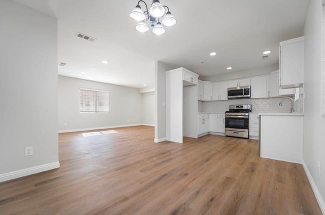 Building Photo - 10306 S Main St Unit Front