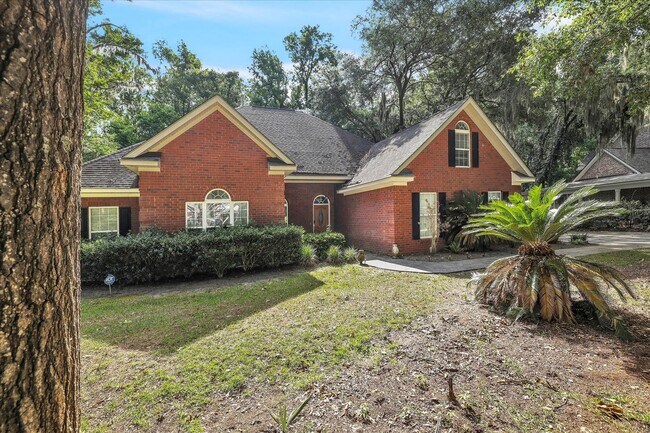 Photo - Stunning all-brick home on a large wooded lot