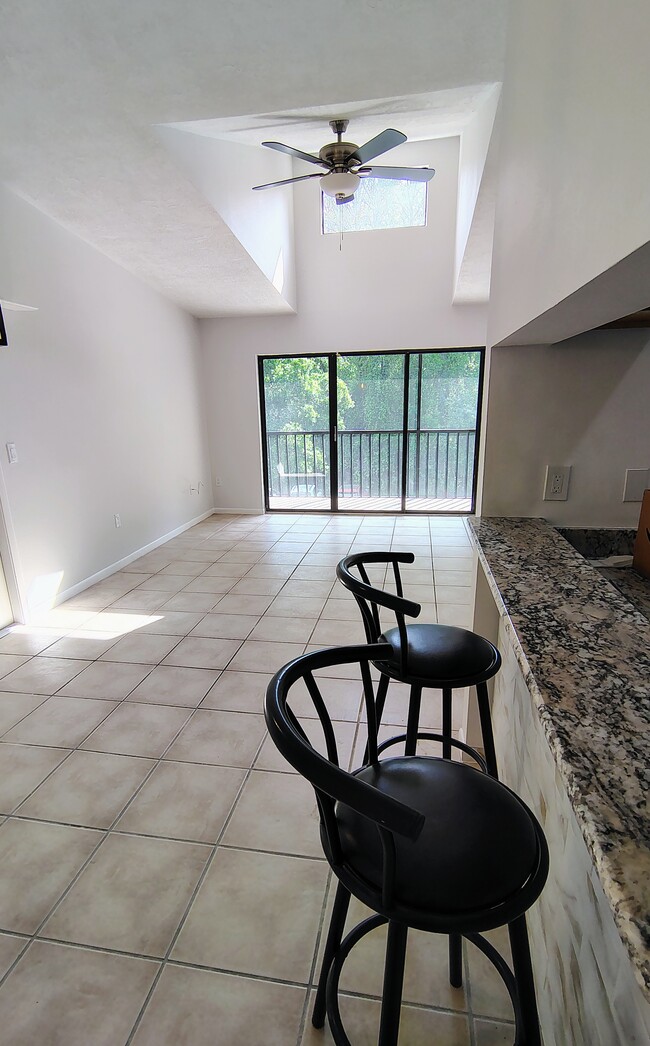 Open dining room/living room - 1353 Pine Ridge Cir E Unit 128 E3