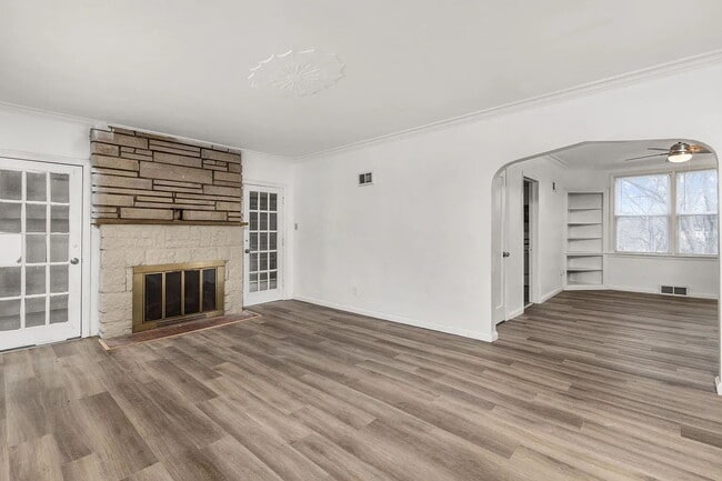 Photo - "Cozy 2-Bedroom, 1 bath Retreat with Fireplace Charm!"  One car garage, section 8 ok.