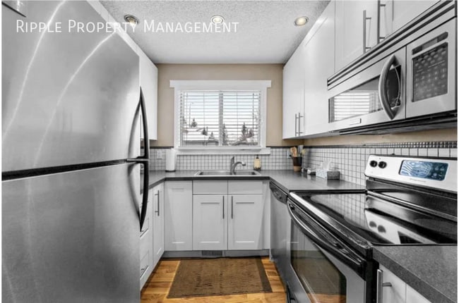 Photo - SPACIOUS 2 BEDS, 1.5 BATHS TOWNHOUSE | Massive Master Suite & Direct Green Space Access