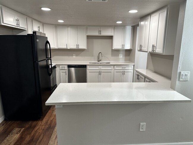 Building Photo - 5541 Bay Blvd Unit #209