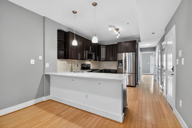 Building Photo - 1241 Kenyon St NW Unit 2