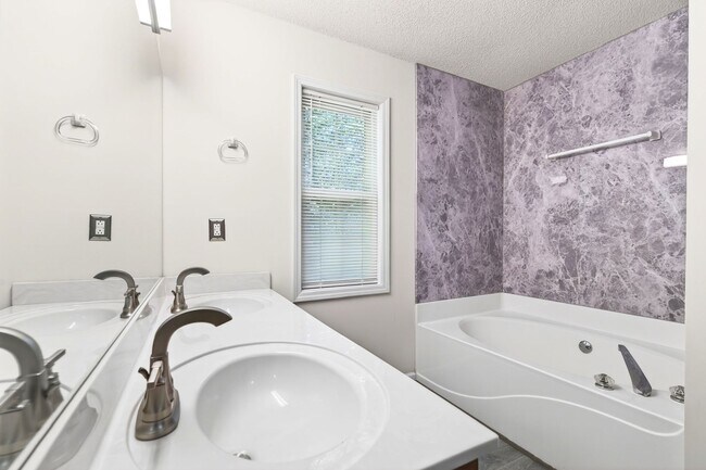 Photo - Beautiful 4BR/3BA Family Home – Minutes from Mall of Georgia!