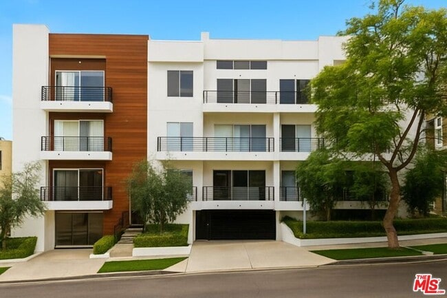 Building Photo - 10630 Wilkins Ave Unit 304