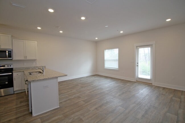 Photo - Don’t Miss This 3BR Townhome in North Pensacola — Garage, Modern Finishes, Community Pool & Easy ...