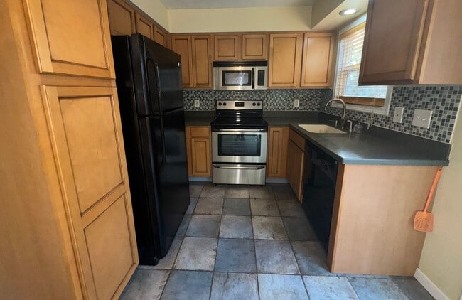 Photo - Charming Remodeled Townhome in Raleigh West - Prime Location w/ Garage & Private Patio