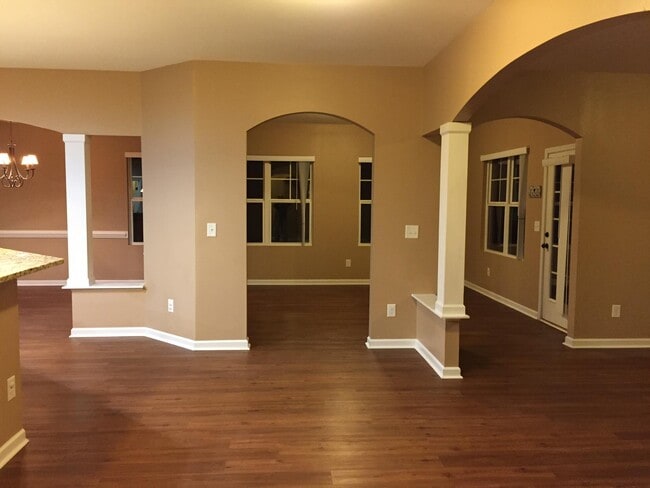 kitchen nook and sunroom in the back