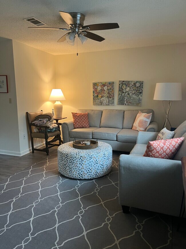 Den furniture and rug included