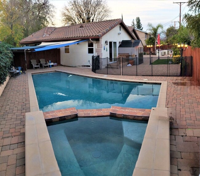 Photo - Exquisite 4 Bedroom + Office Single-Level Residence with Pool/BBQ in a Prime South-of-the-Bouleva...