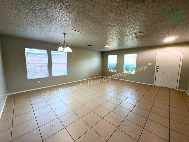 Photo - Spacious 4-Bedroom Home with Fireplace & Large Backyard in SW Fort Worth