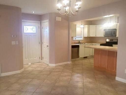 Building Photo - Spacious East Anchorage Home with Yard & Garage!