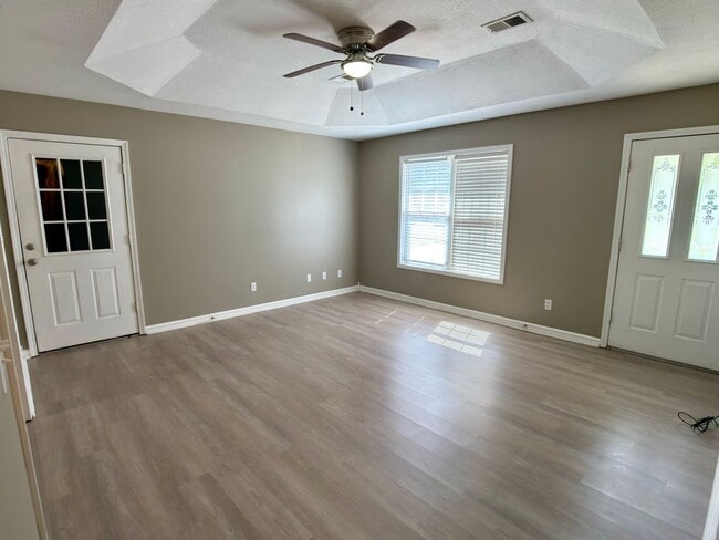 Photo - 3 Bed, 2 Bath Home with Fenced Backyard and 2-Car Garage in Brookland