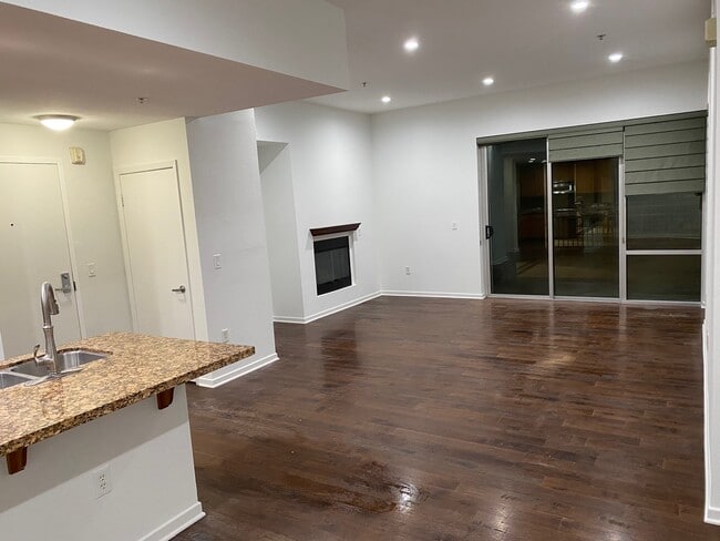 Looking from Dining Room to Family Room to Patio - 111 S De Lacey Ave Unit 114