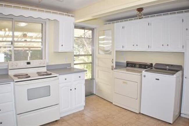 Photo - Updated house with original hardwoods and 2-car garage!