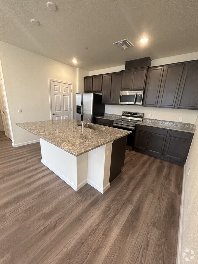 Building Photo - 6153 N Ceylon St Unit 9208 Rental