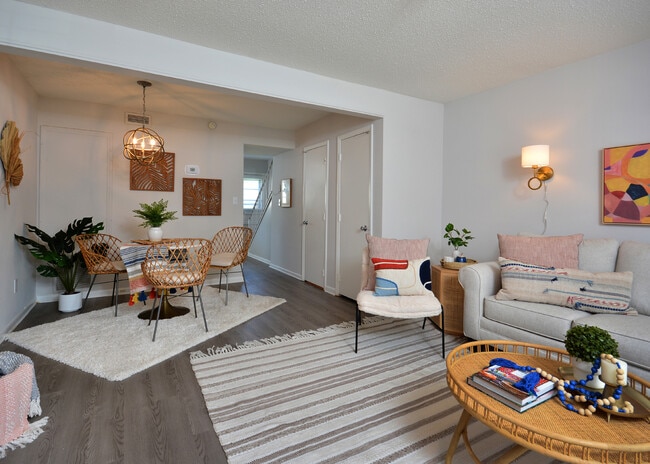 Spacious Living and Dining Room in Newly Renovated Townhome at Trails End Apartments in Burlington,