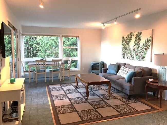 Living Room and Dining - 15116 Sunrise Dr NE Apartment Unit WATER VIEW BEACH ACCESS