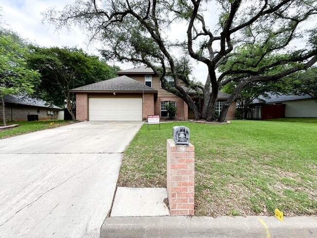 Photo - Available NOW!!!! This beautiful 2 story, 4 bedroom, 2 bath, two car garage with garage door open...