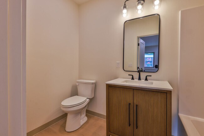 Photo - Modern Remodel with Designer Finishes | All Utilities Included Unit 18