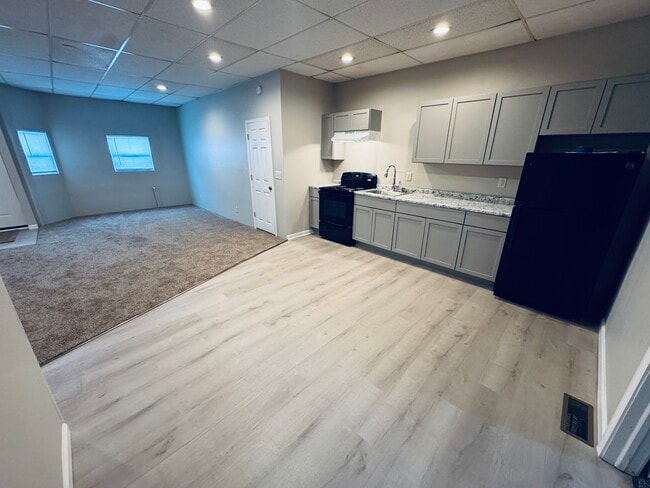 Photo - 351 W 8th St Unit #1 Down