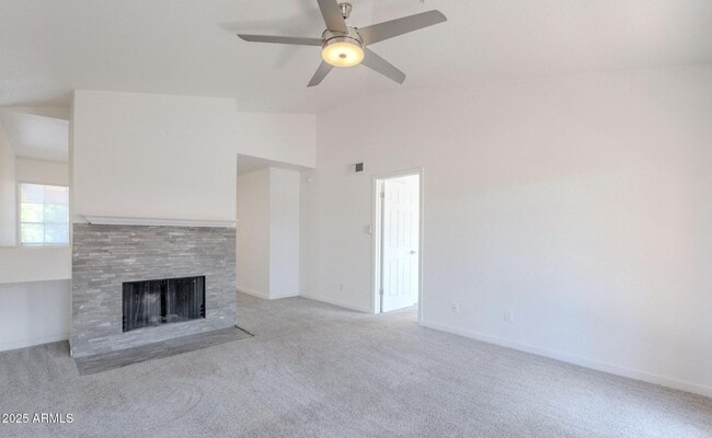 Building Photo - 5950 N 78th St Unit 213