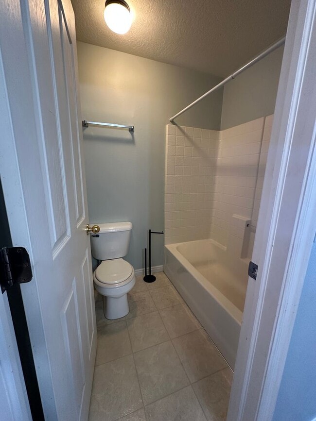 Photo - 1403 Hemmert Unit Master Bedroom