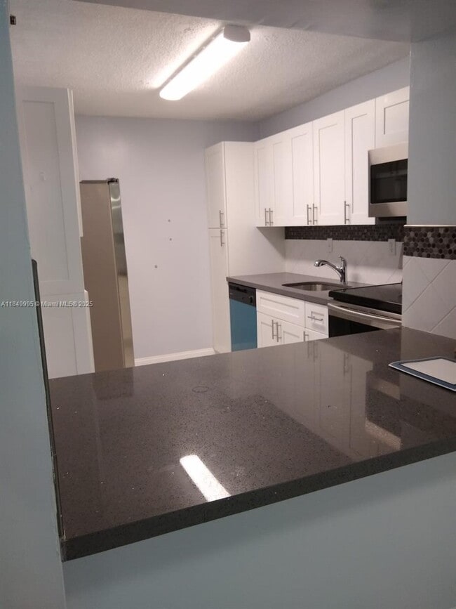 Building Photo - 20680 NE 4th Ct Unit 104 Rental