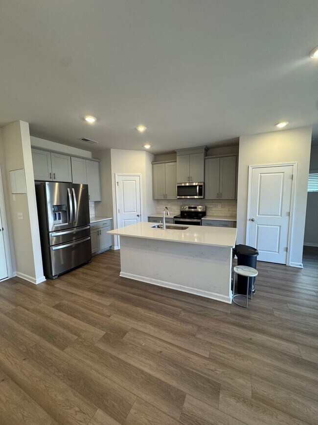 Photo - Beautiful 3BR 2.5 Townhouse w/ 2-Car Garage • EV Plug • Quartz Island • End Unit in Charlotte