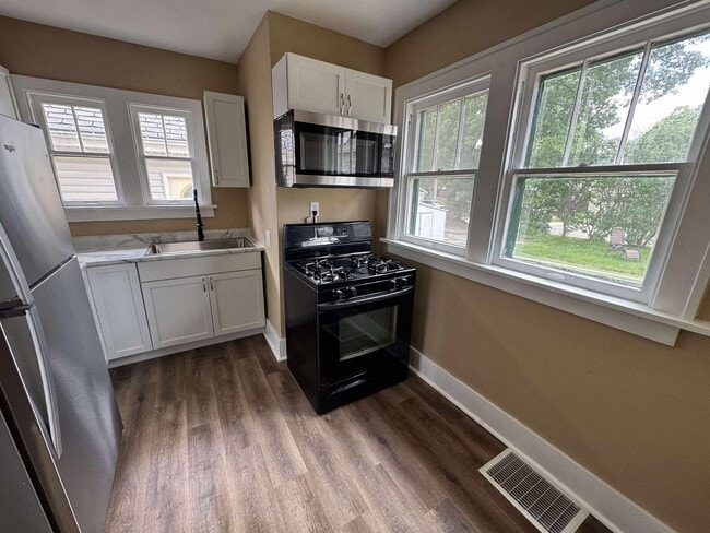 Photo - Charming 4 Bedroom Home in Convenient Rock Island Location