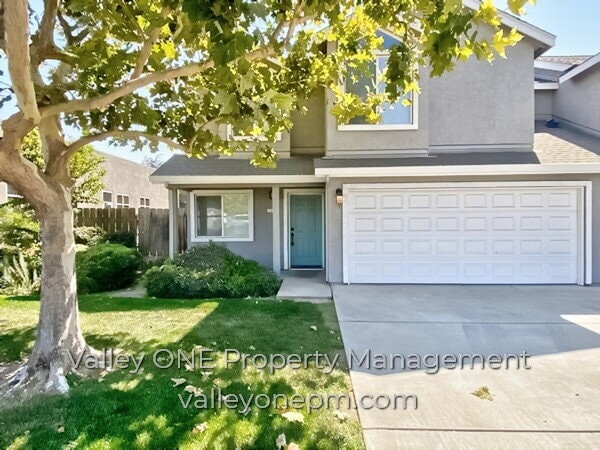 COMING SOON! Private Ground Floor Townhome in Desirable Complex with Attached 2 Car Garage