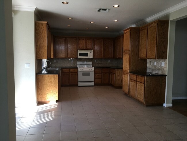 Photo - Charming home in established neighborhood with 4 bedrooms and 3 baths.