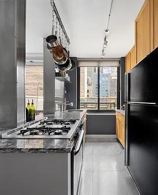 Photo - 111 E 30th St Unidad 16C