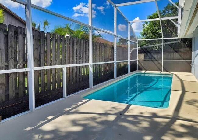 Photo - Charming 3-Bedroom Home with Pool, 2-Car Garage, and Tile Flooring Throughout!