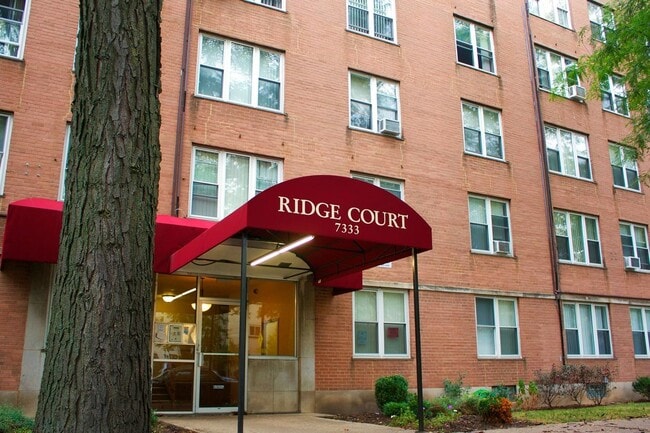 Building Photo - 7333 N Ridge Blvd Unit 111