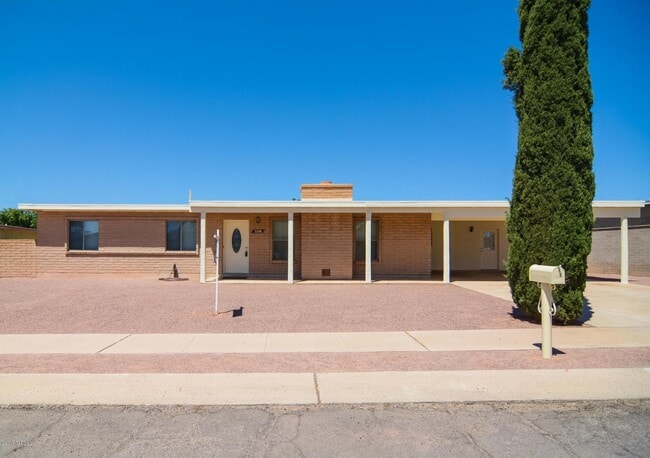 Photo - Spacious 4BR/2BA Tucson Home | Modern Tile Floors & Private Fenced Yard