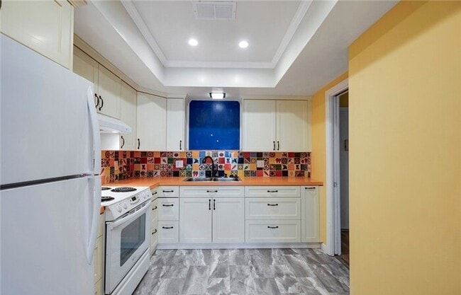 Photo - Updated 1-Bedroom Condo with Garage, Pool & Patio in Prime Fullerton Location Unit 26D