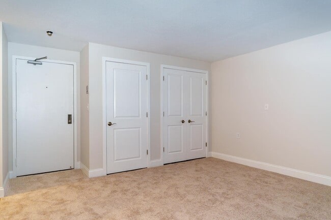 Available carpeted living spaces with extra storage