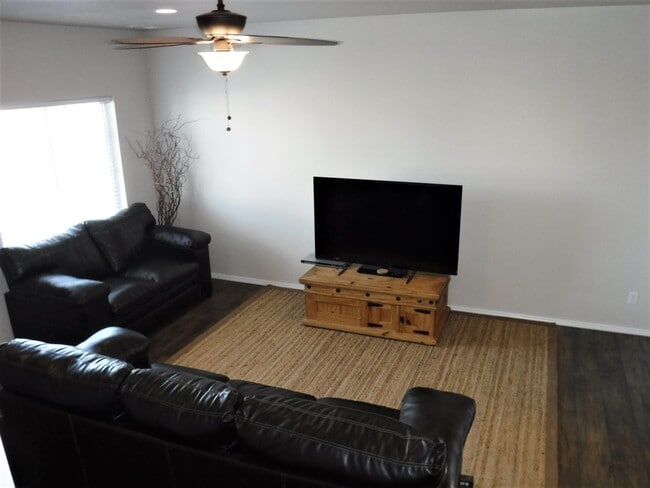 Photo - 4 bed 2.5 bath home just off Pine Ave and N Black Cat Rd.