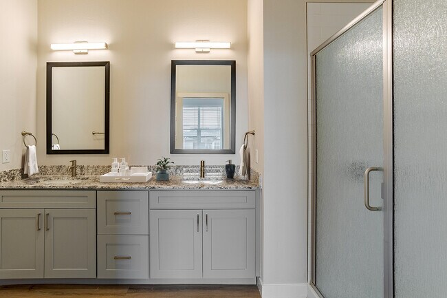 Bathroom with Double Sink Vanity & Shower - Destination at Arista Apartments