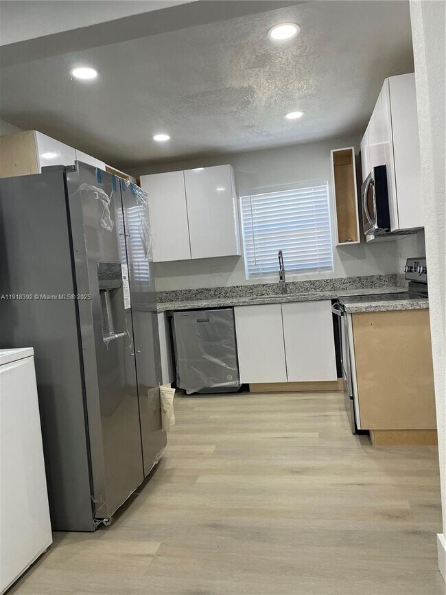 Photo - 5261 NW 1st St Unit FRONT