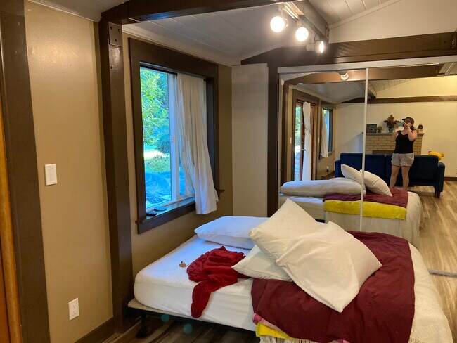 Most people put bed in this area. Mirrored full size + closet