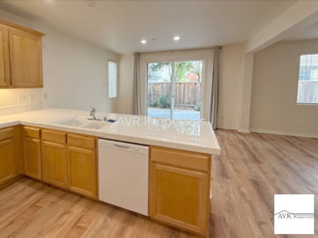 Photo - Spacious home with a large open concept kitchen, dining and living room