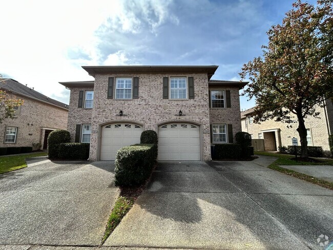 Building Photo - Introducing a stunning townhome/condo in a...