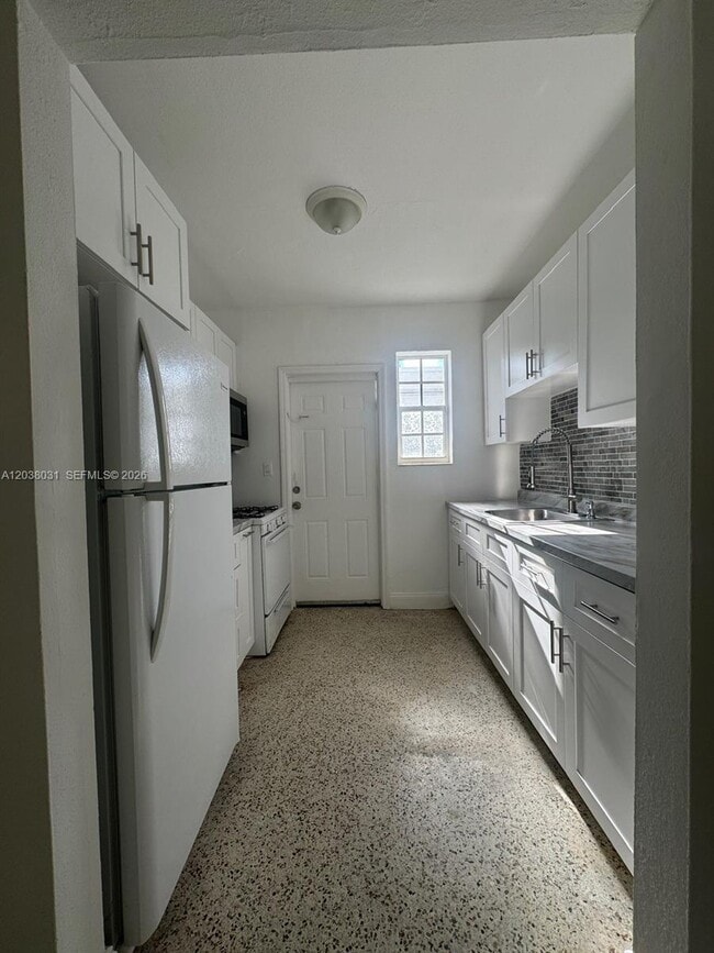 Photo - 735 83rd St Unit 3