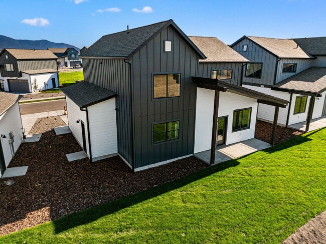 Photo - Lock-and-Leave Luxury Living — Lawn Care & Snow Removal Included!