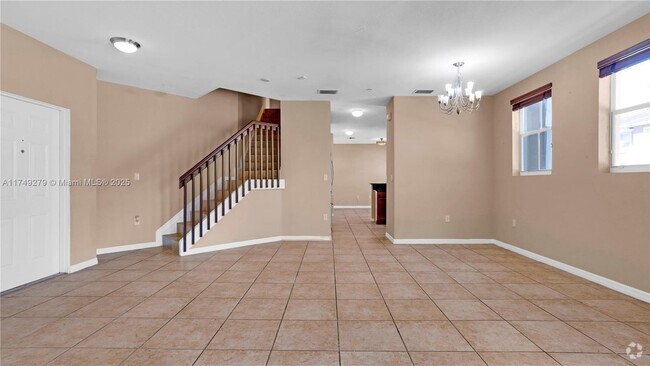 Building Photo - 8899 NW 107th Ct Unit # 208 Rental